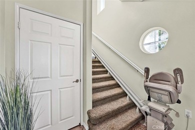 Welcome to a home designed for effortless living. Nestled within on Mile Square Golf Course in California - for sale on GolfHomes.com, golf home, golf lot