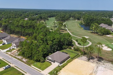 This stunning coastal home overlooks hole # 3 on Gulf Shores on The Golf Club of the Wharf in Alabama - for sale on GolfHomes.com, golf home, golf lot