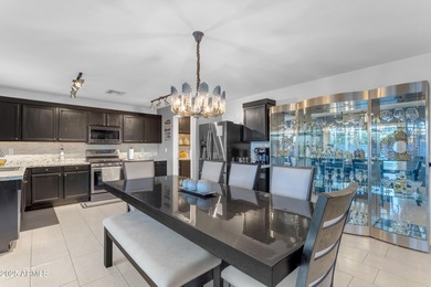 Welcome to this beautifully updated 4-bedroom, 2.5-bath home on The Golf Club At Johnson Ranch in Arizona - for sale on GolfHomes.com, golf home, golf lot