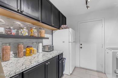 Welcome to this beautifully updated 4-bedroom, 2.5-bath home on The Golf Club At Johnson Ranch in Arizona - for sale on GolfHomes.com, golf home, golf lot