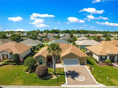 Welcome to this beautifully updated and maintained 3-bedroom 2 on Eagle Ridge At Spruce Creek Country Club in Florida - for sale on GolfHomes.com, golf home, golf lot