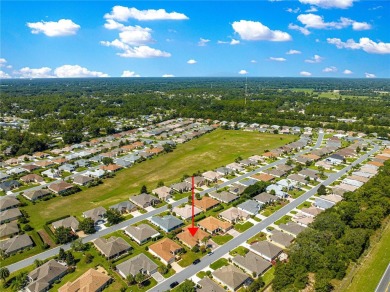 Welcome to this beautifully updated and maintained 3-bedroom 2 on Eagle Ridge At Spruce Creek Country Club in Florida - for sale on GolfHomes.com, golf home, golf lot