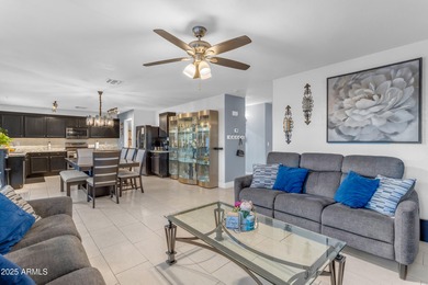 Welcome to this beautifully updated 4-bedroom, 2.5-bath home on The Golf Club At Johnson Ranch in Arizona - for sale on GolfHomes.com, golf home, golf lot