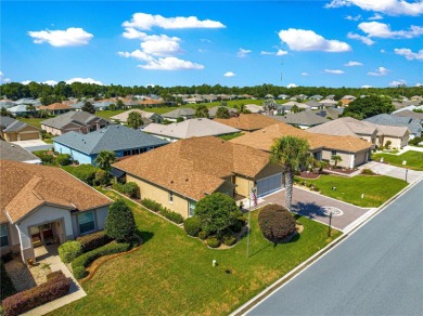 Welcome to this beautifully updated and maintained 3-bedroom 2 on Eagle Ridge At Spruce Creek Country Club in Florida - for sale on GolfHomes.com, golf home, golf lot