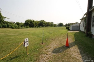 Nestled on a sprawling parcel of just under 3 acres, 43 Avery in on Gowanie Golf Club in Michigan - for sale on GolfHomes.com, golf home, golf lot