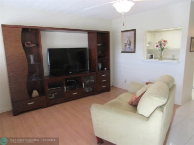 LOVELY 1/1 UNIT IN DURHAM. STEPS TO THE POOL & ACROSS  FROM OUR on Hillsboro Pines Golf in Florida - for sale on GolfHomes.com, golf home, golf lot