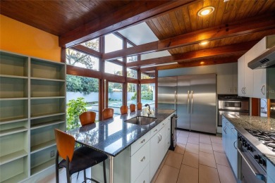 Extraordinary Mid-Century Modern home in the highly desired on Mark Bostick Golf Course At University of Florida in Florida - for sale on GolfHomes.com, golf home, golf lot