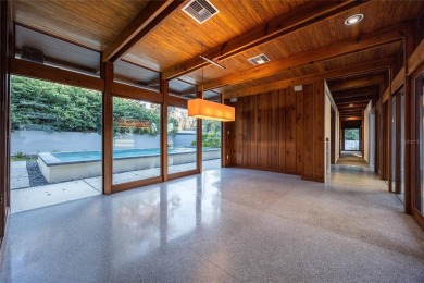 Extraordinary Mid-Century Modern home in the highly desired on Mark Bostick Golf Course At University of Florida in Florida - for sale on GolfHomes.com, golf home, golf lot