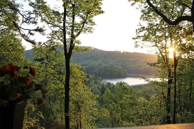 Experience tranquility and breathtaking views at this on Big Canoe Golf Club - Cherokee in Georgia - for sale on GolfHomes.com, golf home, golf lot