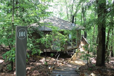Experience tranquility and breathtaking views at this on Big Canoe Golf Club - Cherokee in Georgia - for sale on GolfHomes.com, golf home, golf lot