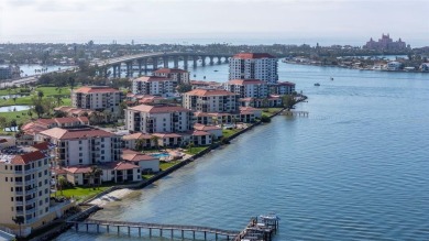 Casa Del Mar Villa.  With stunning water views, this first floor on Isla Del Sol Yacht and Country Club in Florida - for sale on GolfHomes.com, golf home, golf lot