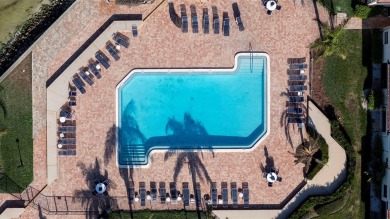 Casa Del Mar Villa.  With stunning water views, this first floor on Isla Del Sol Yacht and Country Club in Florida - for sale on GolfHomes.com, golf home, golf lot
