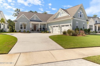 Welcome to luxury living in Cape Fear National! From the moment on Cape Fear National At Brunswick Forest in North Carolina - for sale on GolfHomes.com, golf home, golf lot