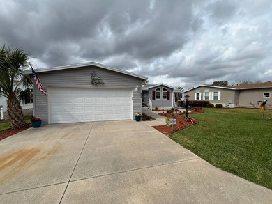Beautifully maintained, unique, spacious open floorplan, located on Water Oak Country Club Estates in Florida - for sale on GolfHomes.com, golf home, golf lot