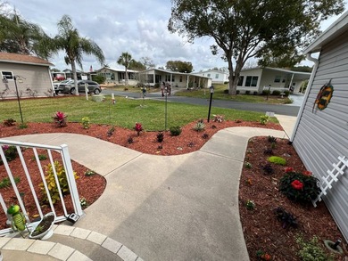 Beautifully maintained, unique, spacious open floorplan, located on Water Oak Country Club Estates in Florida - for sale on GolfHomes.com, golf home, golf lot