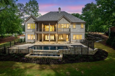 Welcome to your dream home, where timeless European charm meets on Reynolds Lake Oconee - The Landing in Georgia - for sale on GolfHomes.com, golf home, golf lot