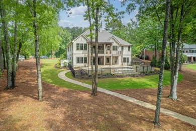 Welcome to your dream home, where timeless European charm meets on Reynolds Lake Oconee - The Landing in Georgia - for sale on GolfHomes.com, golf home, golf lot