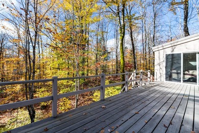 This lovely 4-bedroom, 4-bath home in Eastman features an open on Eastman Golf Links in New Hampshire - for sale on GolfHomes.com, golf home, golf lot