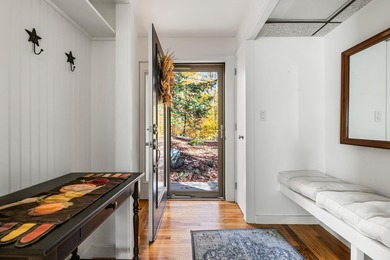 This lovely 4-bedroom, 4-bath home in Eastman features an open on Eastman Golf Links in New Hampshire - for sale on GolfHomes.com, golf home, golf lot