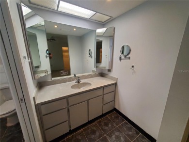 A wonderful well-maintained home located in the desirable on East Lake Woodlands Country Club in Florida - for sale on GolfHomes.com, golf home, golf lot