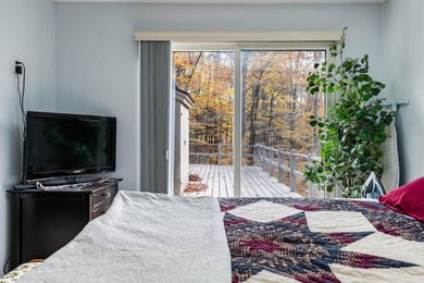 This lovely 4-bedroom, 4-bath home in Eastman features an open on Eastman Golf Links in New Hampshire - for sale on GolfHomes.com, golf home, golf lot