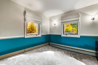 This lovely 4-bedroom, 4-bath home in Eastman features an open on Eastman Golf Links in New Hampshire - for sale on GolfHomes.com, golf home, golf lot