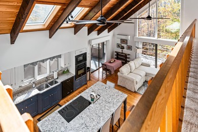 This lovely 4-bedroom, 4-bath home in Eastman features an open on Eastman Golf Links in New Hampshire - for sale on GolfHomes.com, golf home, golf lot