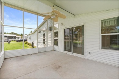 TRIPLE WIDE**NO STEPS**Walk-in Level with Sidewalk. 3/2 Split on Zellwood Station Country Club in Florida - for sale on GolfHomes.com, golf home, golf lot