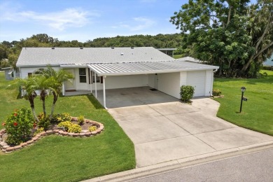 TRIPLE WIDE**NO STEPS**Walk-in Level with Sidewalk. 3/2 Split on Zellwood Station Country Club in Florida - for sale on GolfHomes.com, golf home, golf lot