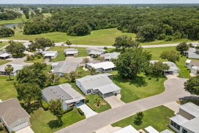 TRIPLE WIDE**NO STEPS**Walk-in Level with Sidewalk. 3/2 Split on Zellwood Station Country Club in Florida - for sale on GolfHomes.com, golf home, golf lot