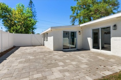 MOTIVATED SELLER!  Impressive Mid-Century Modern Belleair home on Belleair Country Club in Florida - for sale on GolfHomes.com, golf home, golf lot