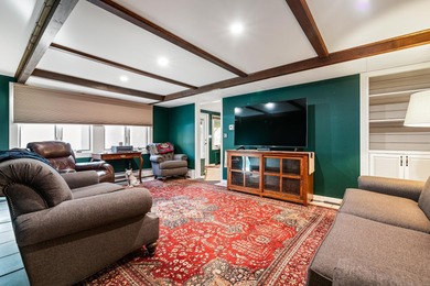 This lovely 4-bedroom, 4-bath home in Eastman features an open on Eastman Golf Links in New Hampshire - for sale on GolfHomes.com, golf home, golf lot