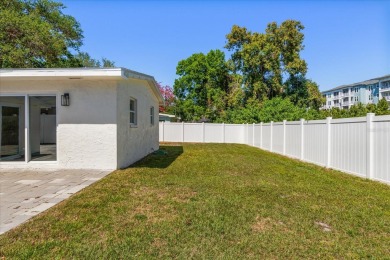 MOTIVATED SELLER!  Impressive Mid-Century Modern Belleair home on Belleair Country Club in Florida - for sale on GolfHomes.com, golf home, golf lot