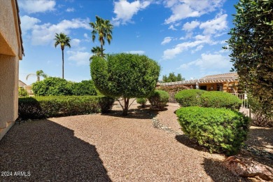 Welcome to your entertainer's dream home! This spacious home on Sun City Grand Golf Couse and Club in Arizona - for sale on GolfHomes.com, golf home, golf lot