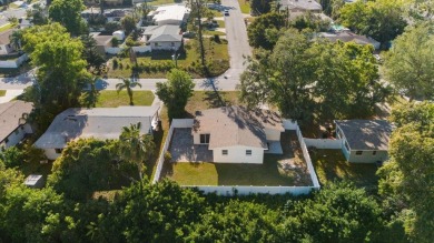 MOTIVATED SELLER!  Impressive Mid-Century Modern Belleair home on Belleair Country Club in Florida - for sale on GolfHomes.com, golf home, golf lot