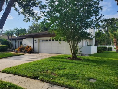 A wonderful well-maintained home located in the desirable on East Lake Woodlands Country Club in Florida - for sale on GolfHomes.com, golf home, golf lot