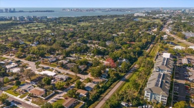 MOTIVATED SELLER!  Impressive Mid-Century Modern Belleair home on Belleair Country Club in Florida - for sale on GolfHomes.com, golf home, golf lot