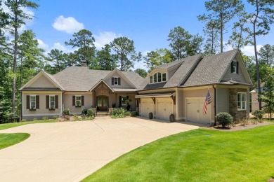 Live the lake life you've always dreamed of in this stunning on Reynolds Lake Oconee - The Oconee in Georgia - for sale on GolfHomes.com, golf home, golf lot