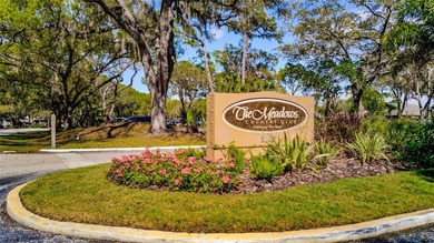 This sunny 2nd Floor condo turnkey furnished, has been remodeled on The Meadows Golf and Country Club in Florida - for sale on GolfHomes.com, golf home, golf lot