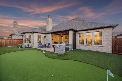 One bedroom is currently an office with French doors, the plan on The Tribute At the Colony in Texas - for sale on GolfHomes.com, golf home, golf lot