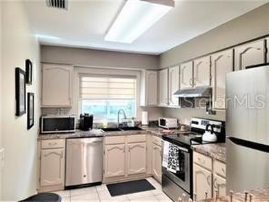 This sunny 2nd Floor condo turnkey furnished, has been remodeled on The Meadows Golf and Country Club in Florida - for sale on GolfHomes.com, golf home, golf lot