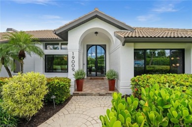 Rarely available Estate Home with Water and Golf Views available on Estero Country Club in Florida - for sale on GolfHomes.com, golf home, golf lot