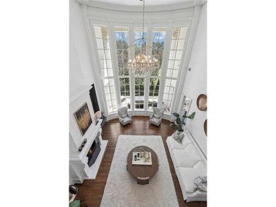 This extraordinary estate in the prestigious Windward community on The Golf Club of Georgia in Georgia - for sale on GolfHomes.com, golf home, golf lot