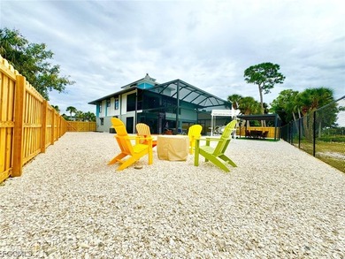 Discover refined living in this exceptional three-story on Alden Pines Golf Club in Florida - for sale on GolfHomes.com, golf home, golf lot