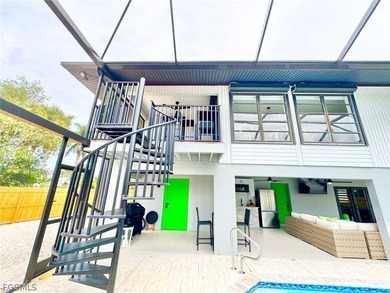 Discover refined living in this exceptional three-story on Alden Pines Golf Club in Florida - for sale on GolfHomes.com, golf home, golf lot