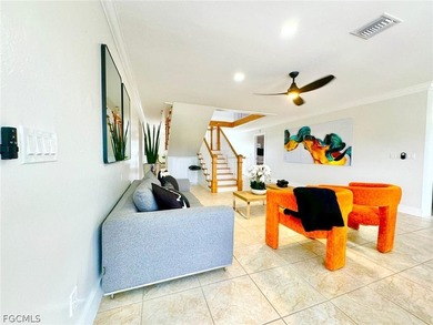 Discover refined living in this exceptional three-story on Alden Pines Golf Club in Florida - for sale on GolfHomes.com, golf home, golf lot