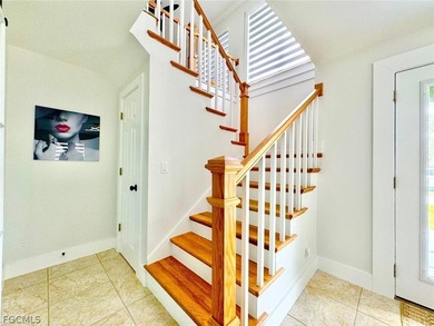 Discover refined living in this exceptional three-story on Alden Pines Golf Club in Florida - for sale on GolfHomes.com, golf home, golf lot