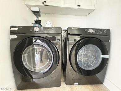 Discover refined living in this exceptional three-story on Alden Pines Golf Club in Florida - for sale on GolfHomes.com, golf home, golf lot