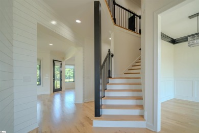 From the moment you arrive at Woodfin's Golf Course Community on Woodfin Ridge Golf Club in South Carolina - for sale on GolfHomes.com, golf home, golf lot
