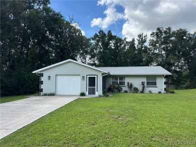 Charming Renovated Home in Citrus Springs - Move-In Ready! This on Citrus Springs Country Club in Florida - for sale on GolfHomes.com, golf home, golf lot